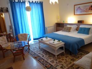 Кровать или кровати в номере Casal das Oliveiras