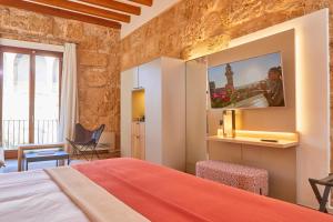 Postel nebo postele na pokoji v ubytování Santa Clara Urban Hotel & Spa