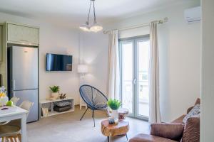 TV a/nebo společenská místnost v ubytování Sweet Home Naxos