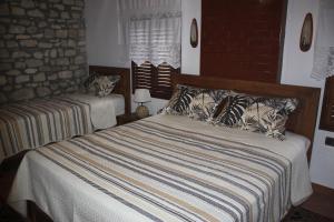 Postel nebo postele na pokoji v ubytování Guesthouse Arjan
