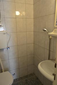 Koupelna v ubytování Apartments Stanka
