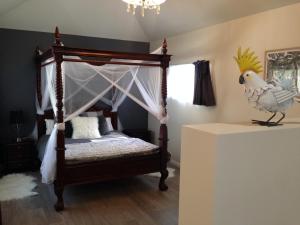 A bed or beds in a room at Fell Estate Cottages