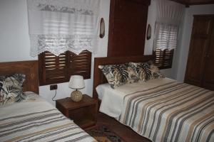 Postel nebo postele na pokoji v ubytování Guesthouse Arjan