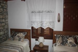 Postel nebo postele na pokoji v ubytování Guesthouse Arjan
