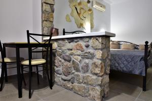 Postelja oz. postelje v sobi nastanitve Kafouros Hotel