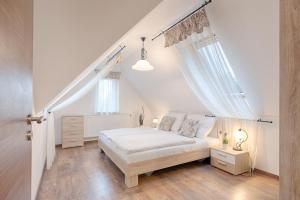 Posteľ alebo postele v izbe v ubytovaní Fortuna 7 Apartments