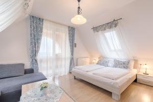 Posteľ alebo postele v izbe v ubytovaní Fortuna 7 Apartments