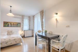 Posteľ alebo postele v izbe v ubytovaní Fortuna 7 Apartments