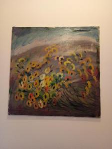 a painting of flowers on a wall at La Residence da Caterina in Vittorio Veneto