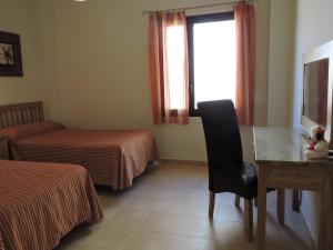 A bed or beds in a room at HL 010 3 bedroom apartment on HDA Golf Resort