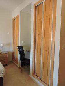 A bed or beds in a room at HL 010 3 bedroom apartment on HDA Golf Resort