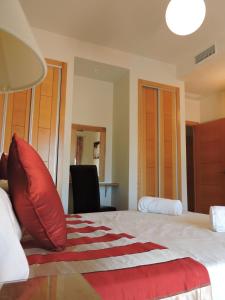 A bed or beds in a room at HL 010 3 bedroom apartment on HDA Golf Resort