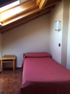Cama o camas de una habitación en Hotel San Roque