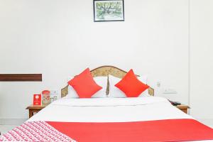 Postel nebo postele na pokoji v ubytování Hotel Rajdeep