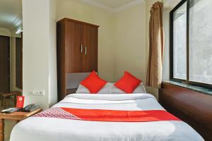 Postel nebo postele na pokoji v ubytování Hotel Rajdeep