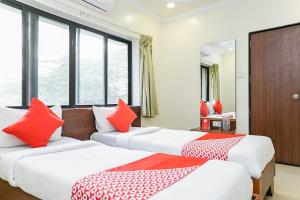 Postel nebo postele na pokoji v ubytování Hotel Rajdeep