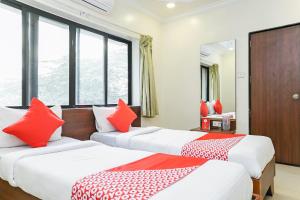 Voodi või voodid majutusasutuse Hotel Rajdeep toas