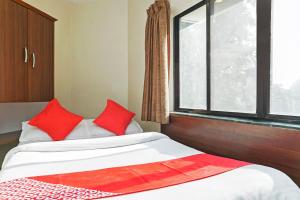 Postel nebo postele na pokoji v ubytování Hotel Rajdeep