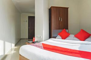 Postel nebo postele na pokoji v ubytování Hotel Rajdeep
