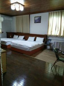Giường trong phòng chung tại The Country B&B +17 ảnh