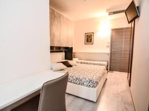 TV a/nebo společenská místnost v ubytování Hotel Gardesana