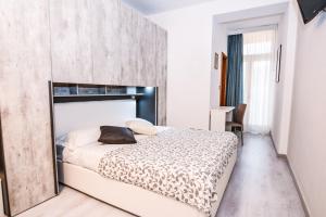 Postel nebo postele na pokoji v ubytování Hotel Gardesana