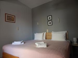 Postel nebo postele na pokoji v ubytování Posidonio Hotel