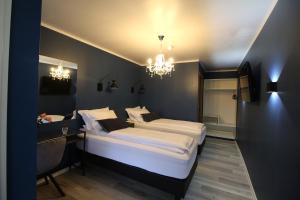 Krevet ili kreveti u jedinici u okviru objekta Hotel North