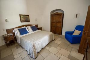 Postel nebo postele na pokoji v ubytování Il Palmento Hotel Relais