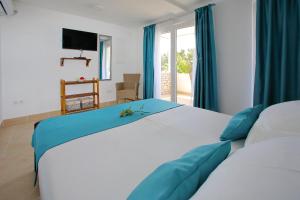 Cama o camas de una habitación en Apartments Brankica