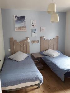 מיטה או מיטות בחדר ב-Lili