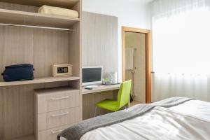Postel nebo postele na pokoji v ubytování Hotel Venezia