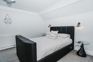 Postel nebo postele na pokoji v ubytování Elysian Fields B&B
