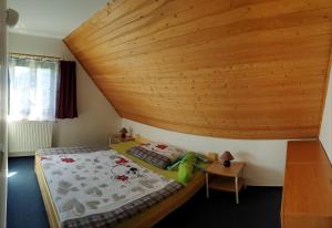 Postel nebo postele na pokoji v ubytování Happy Chalet + 11 fotografií
