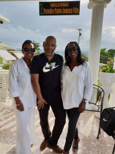 a group of three people posing for a picture at Paradise Palms Jamaica Vacation Rental in Montego Bay