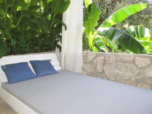 Posteľ alebo postele v izbe v ubytovaní Relax tiny villas 40 meters of the beach + 37 fotografií