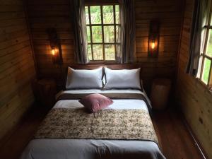 Postel nebo postele na pokoji v ubytování Palmas de Cocora