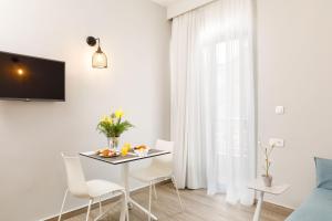 TV a/nebo společenská místnost v ubytování Sofia Hotel