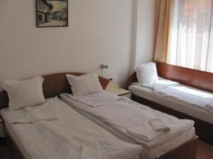 Cama o camas de una habitación en Stop Hotel