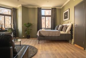 Postel nebo postele na pokoji v ubytování Hotel Fredrikstad