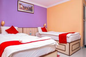 Postel nebo postele na pokoji v ubytování Hotel Tranquil