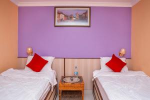 Postel nebo postele na pokoji v ubytování Hotel Tranquil