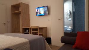 TV a/nebo společenská místnost v ubytování B&B Vanessa
