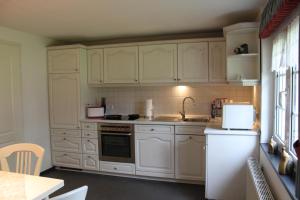 Η κουζίνα ή μικρή κουζίνα στο Ferienwohnung Haus Stein