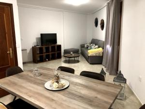 Μια τηλεόραση ή/και κέντρο ψυχαγωγίας στο Apartamento SC Victoria
