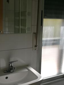 Kúpeľňa v ubytovaní Pension Santiago