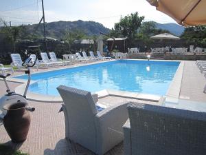 The swimming pool at or near B&B Il Sole Nascente