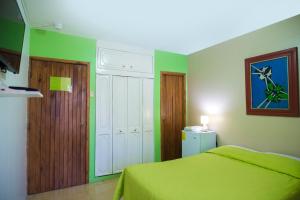 Postel nebo postele na pokoji v ubytování North Star Hostal Guayaquil