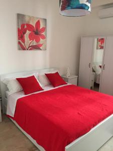 Postel nebo postele na pokoji v ubytování B&B Scilla Mare