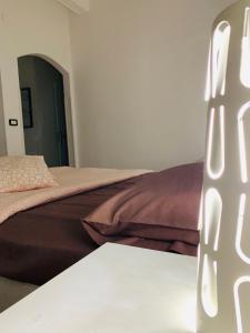 Postel nebo postele na pokoji v ubytování B&B Scilla Mare
